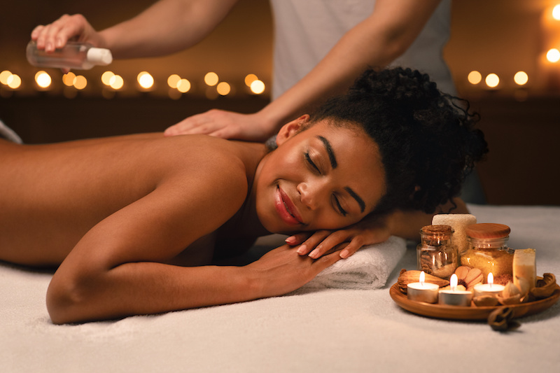 Woman enjoying aromatherapy massage at the spa